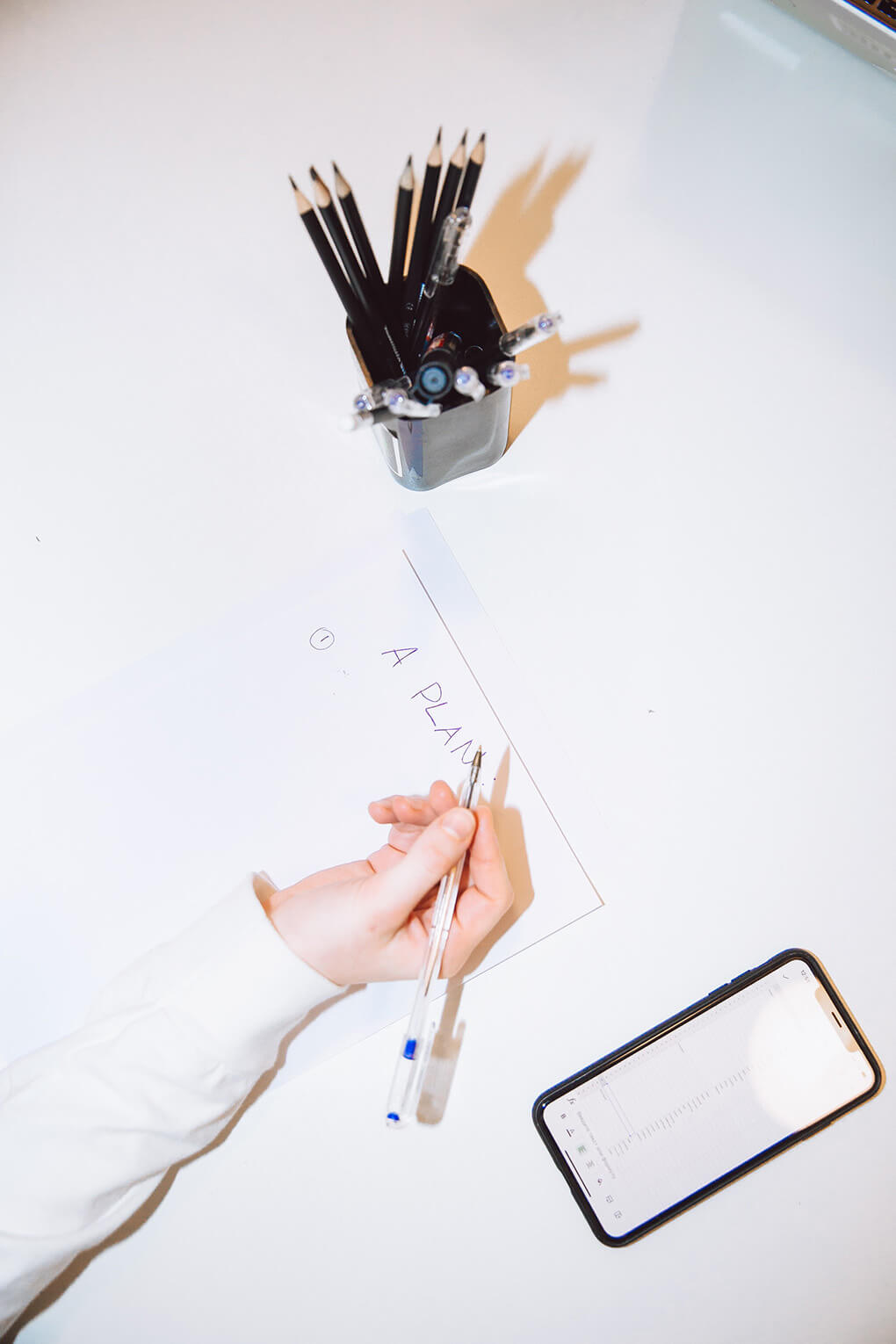 drawing a plan on paper